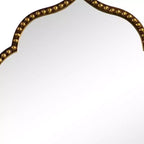 Miroir décoratif encadré en arc perlé en métal doré de 36 po